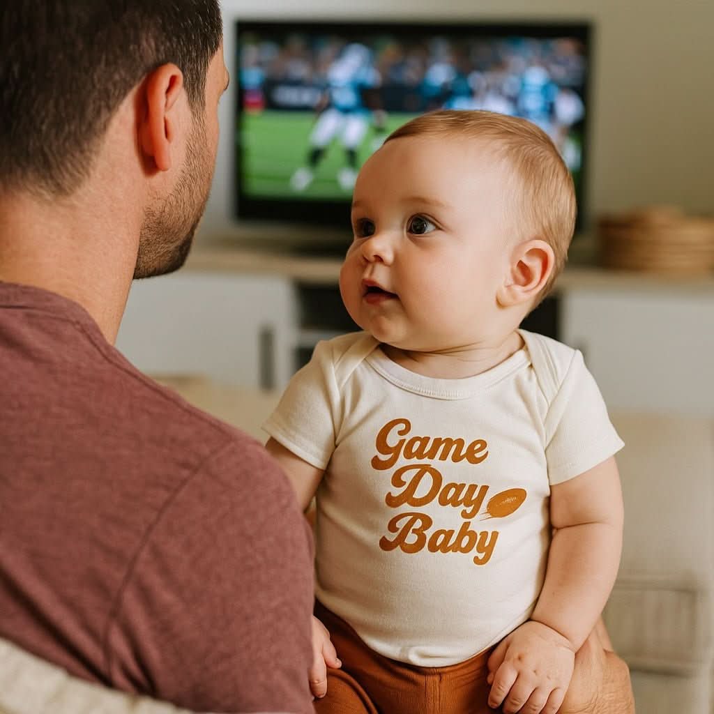 Baby onesie with 'Game Day Baby' text on a white background with football graphic - Island Soul Clothing & Gifts Seaside Heights