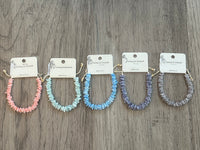 Five puka shell bracelets in the colors salmon, seafoam, ocean blue, purple and gray - Island Soul Clothing & Gifts Seaside Heights New Jersey